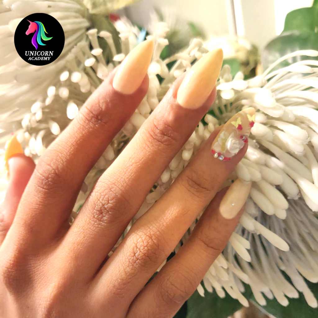 Unicorn Academy India | 3D floral design on delicate pink gel nails.