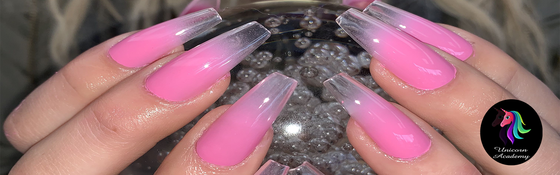 Glassy pink nails with a high-shine finish.