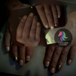 Real Student Reviews | Close-up photo of a hand with perfectly applied chrome nails in a bold, reflective color. Ideal for those who love a sleek, sophisticated look.