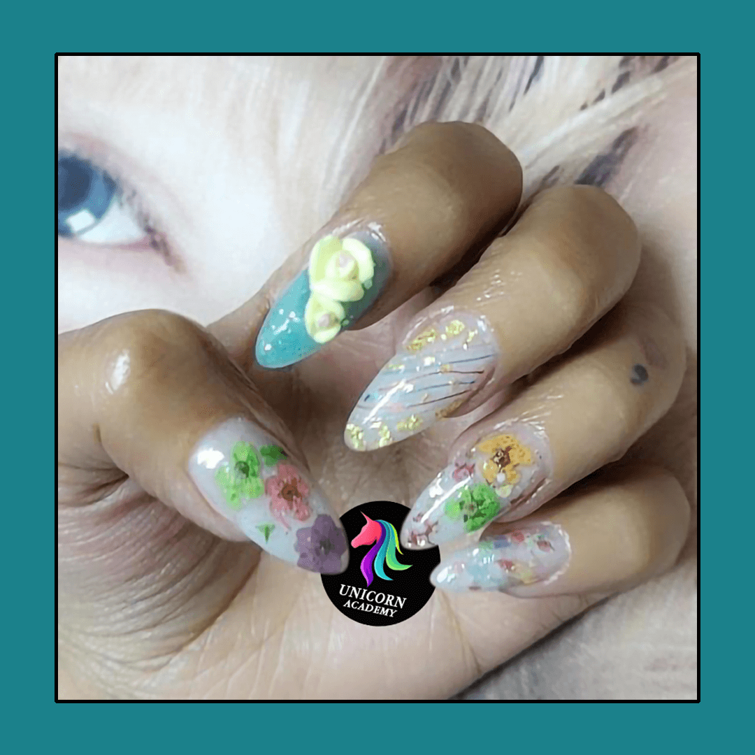 Nail Courses | Delicate floral design with 3D elements on nails.