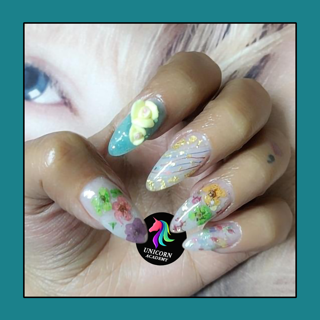 Unicorn Academy India | Delicate floral design with 3D elements on nails.